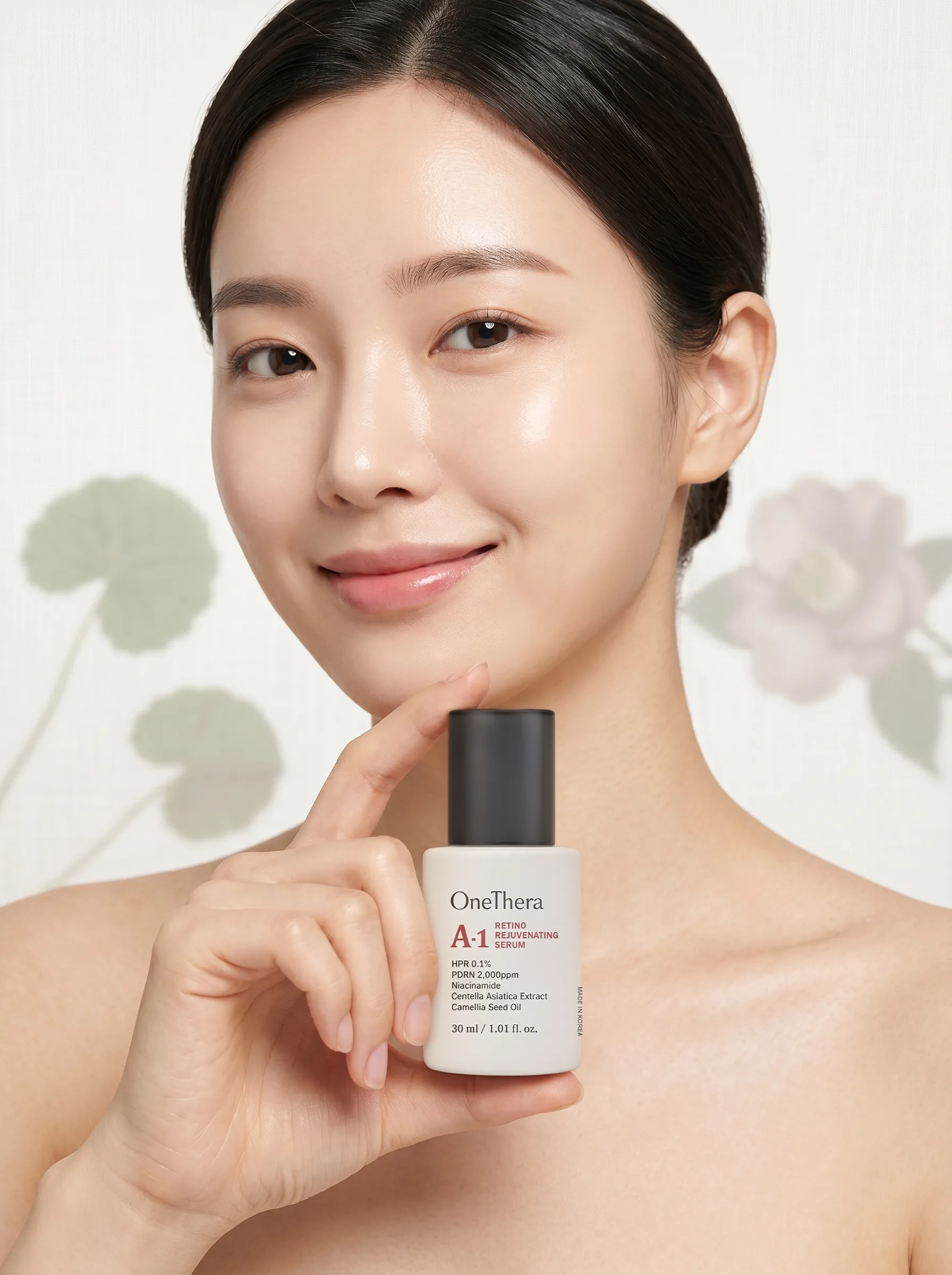 Asian model holding A-1 Serum with Gat cap